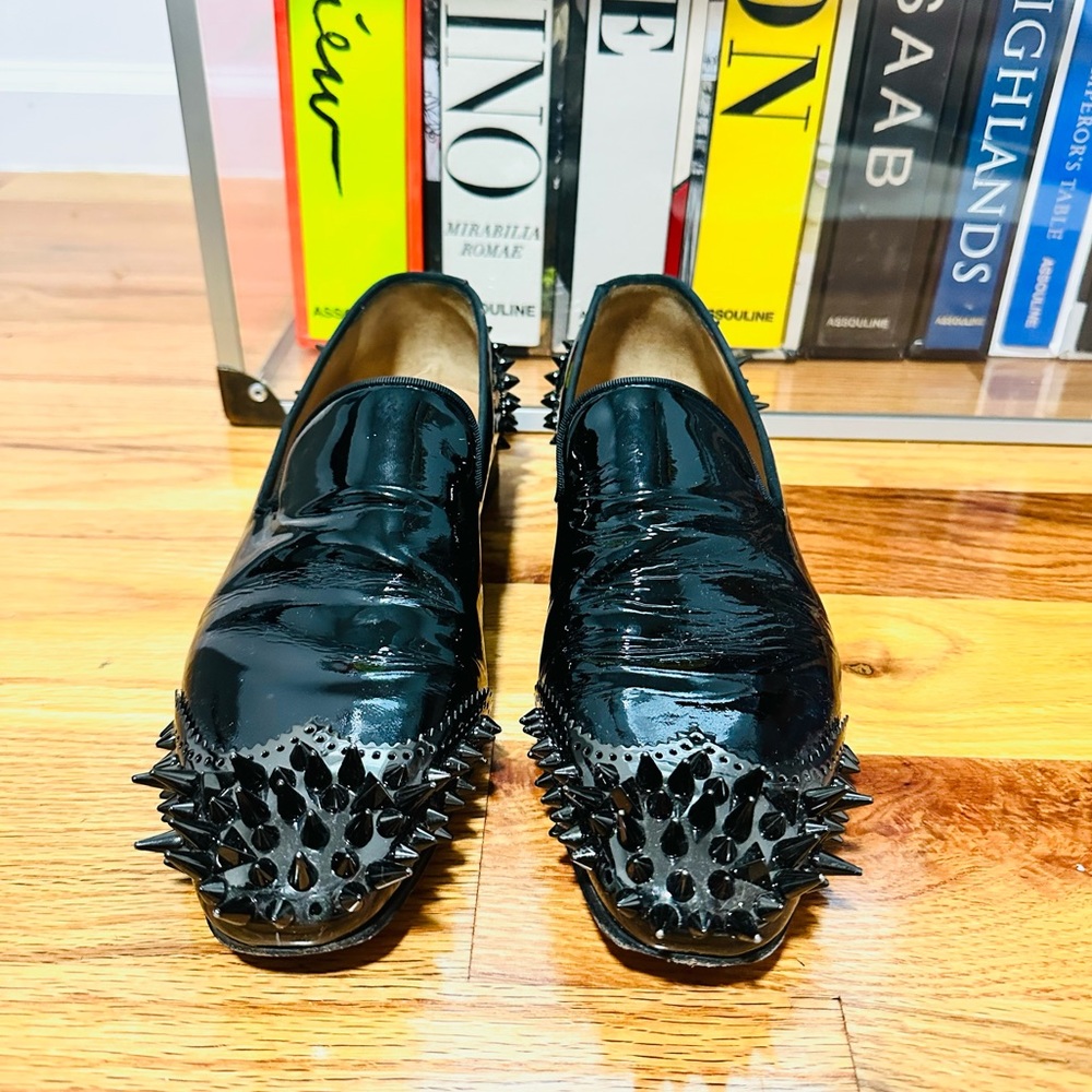 Christian Louboutin TYRONITO spiked wingtip loafer in Patent leather